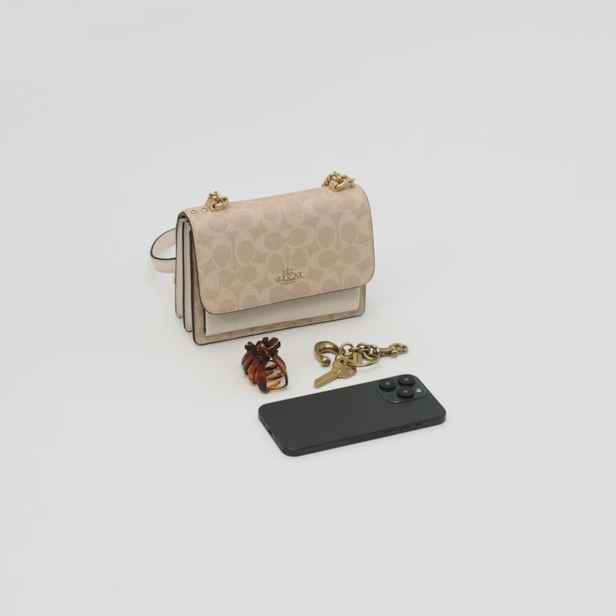 Cargar vídeo: Bolsa Coach Mini Klare Crossbody Bag In Signature Canvas