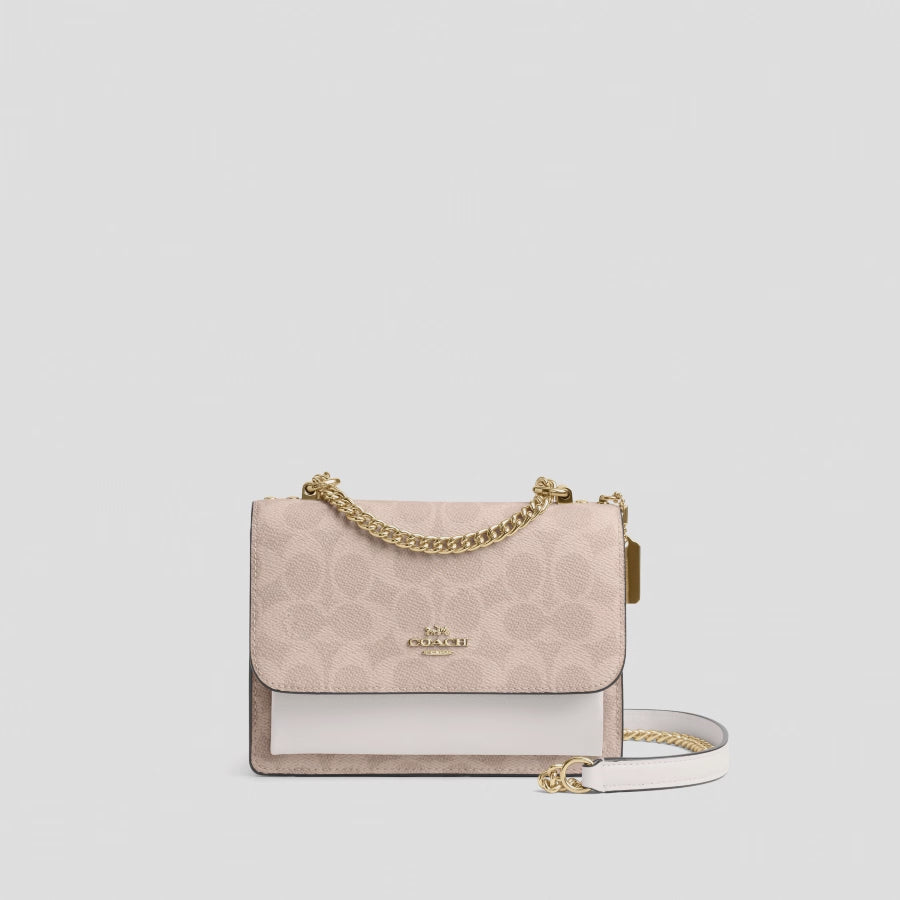 Cargar vídeo: Bolsa Coach Mini Klare Crossbody Bag In Signature Canvas