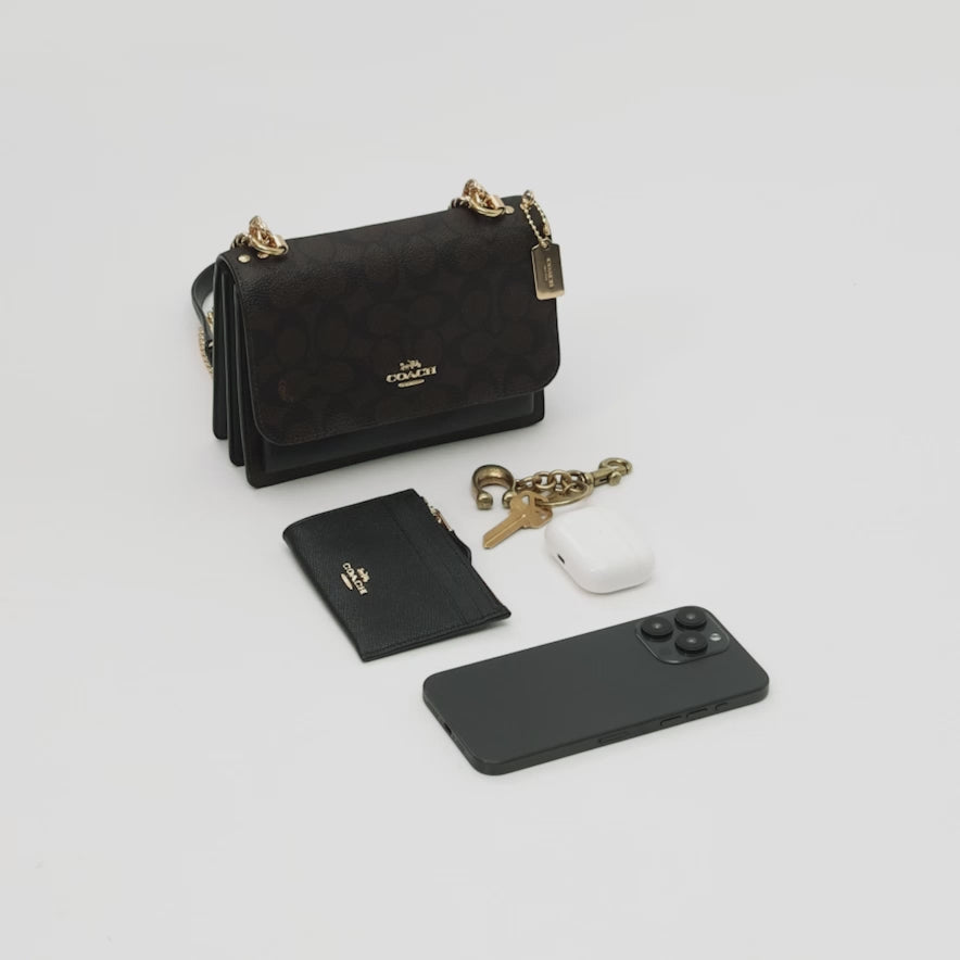 Cargar vídeo: Bolsa Coach Mini Klare Crossbody Bag In Signature Canvas
